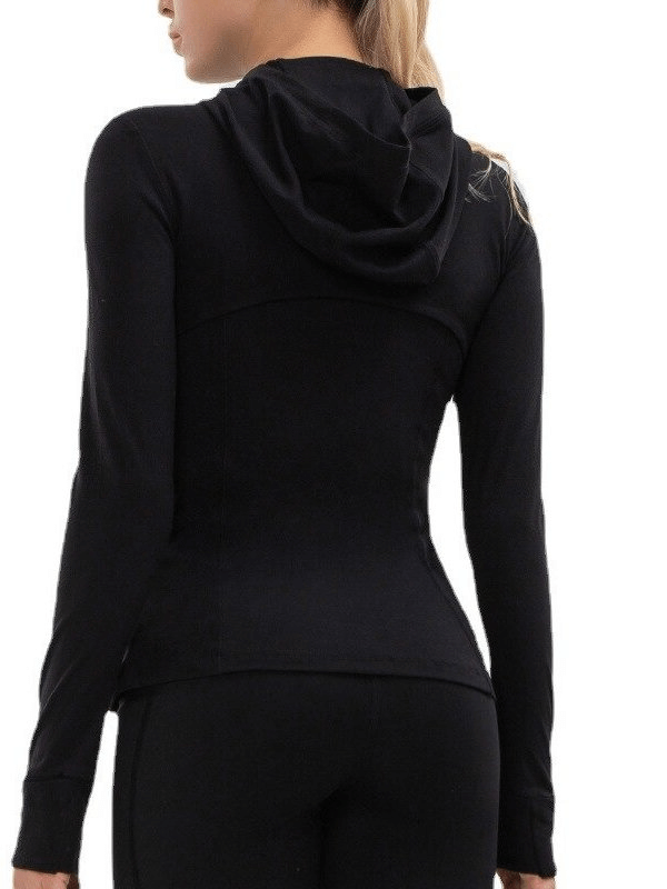 Back view of women's long-sleeve quick-drying sports shirt in black, perfect for yoga. Ideal women's activewear for comfort and style.